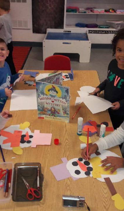 Reading About and Creating Construction Paper Snowmen