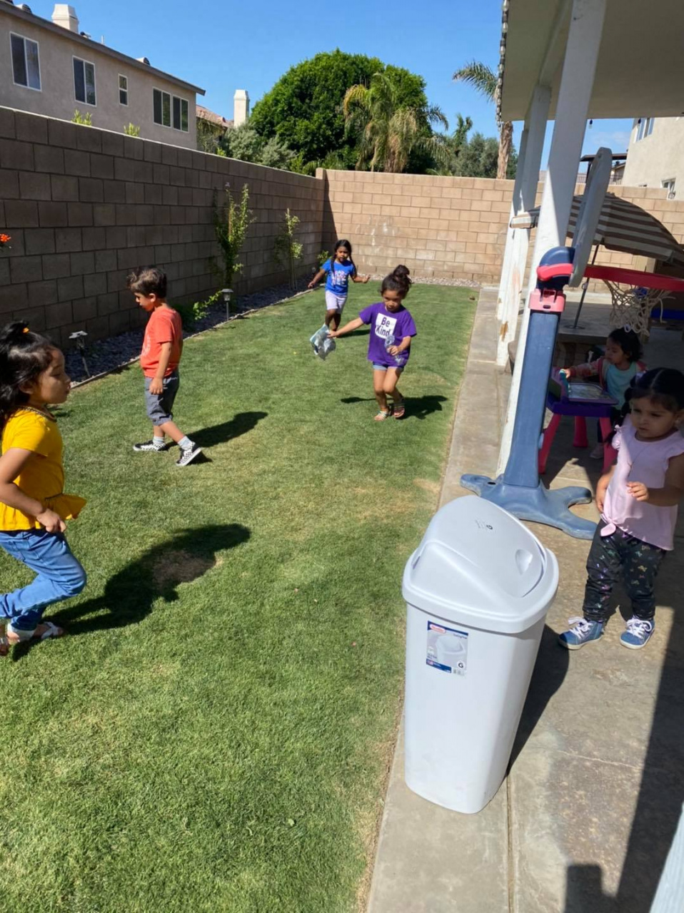 Practicing Sorting Recycling and Garbage Along with Picking it Up