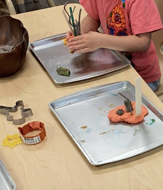 Play dough art with nature materials