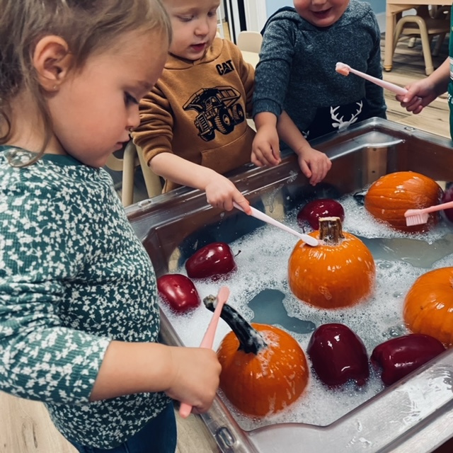 Washing pumpkins & apples