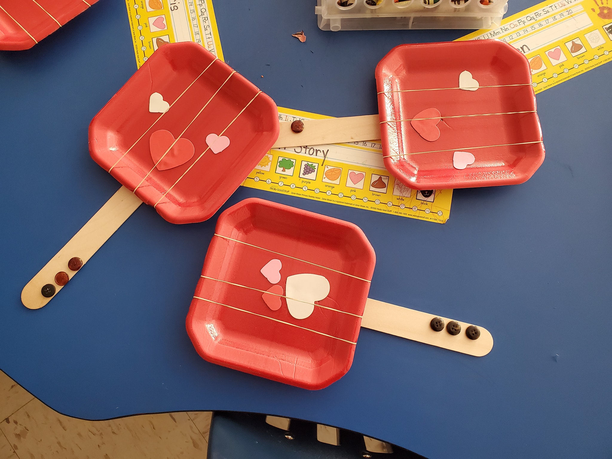 Ukulele Craft With Elastic Bands and a Paper Plate.