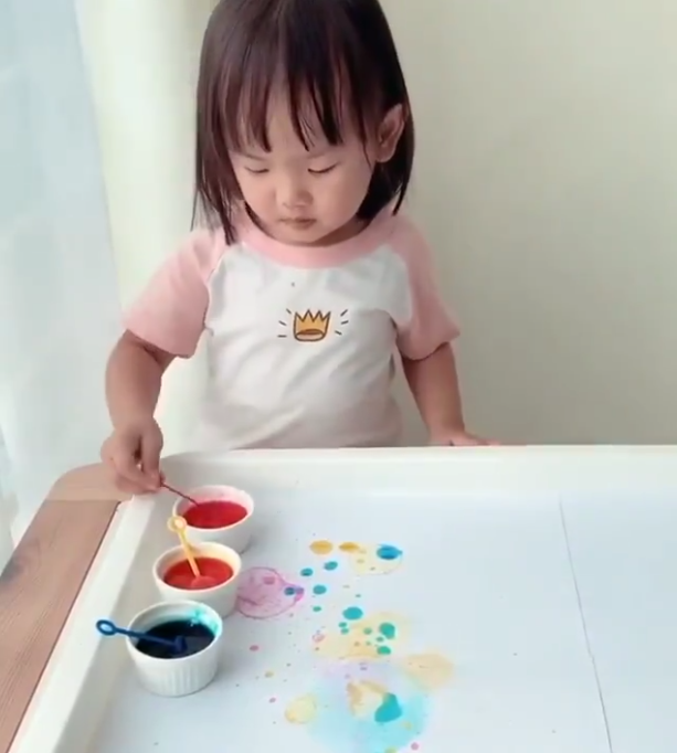 Child Blowing Bubbles Painting