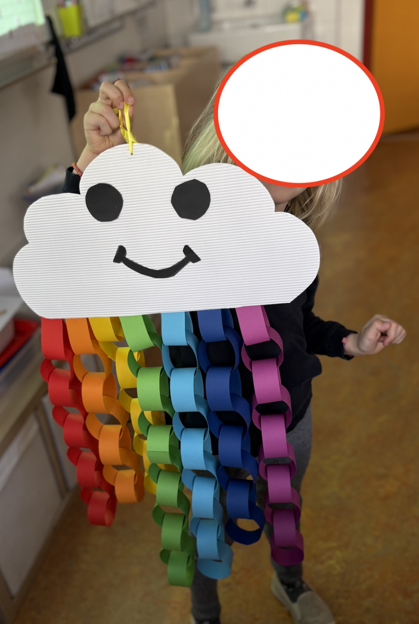 Rainbow cloud with coloured strips of paper, ideal for the month of March